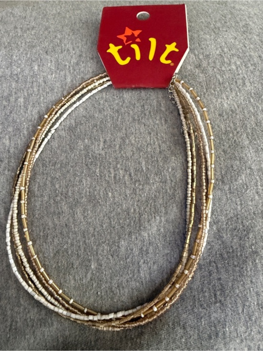 TILT Multi-Strand Beaded Necklace in Gold and White